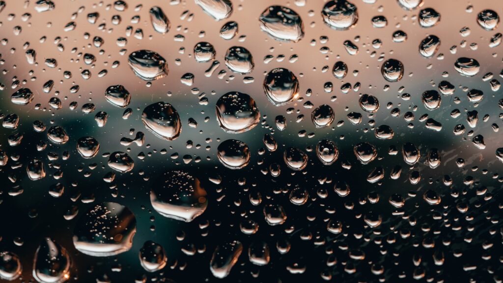 Photo Of Water Droplets On Glass Window